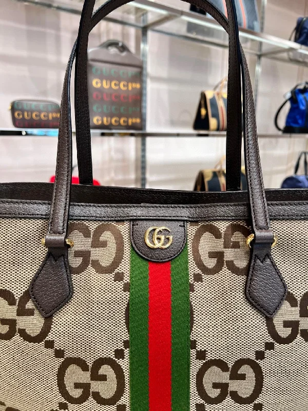 Women Gucci Sylvie bags with a leather - wrapped handlePreOrder Gucci jumbo GG canvas tote