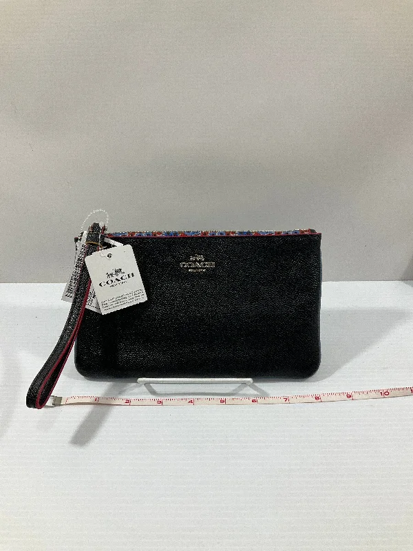 Coach bags with a back - zip pocket for storing valuables securelyWristlet Designer By Coach, Size: Medium