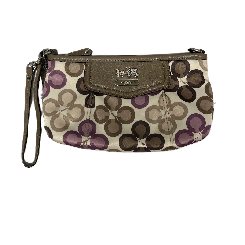 Coach bags with a front - flap pocket and a turnlock for a classic aestheticWristlet Designer By Coach, Size: Medium