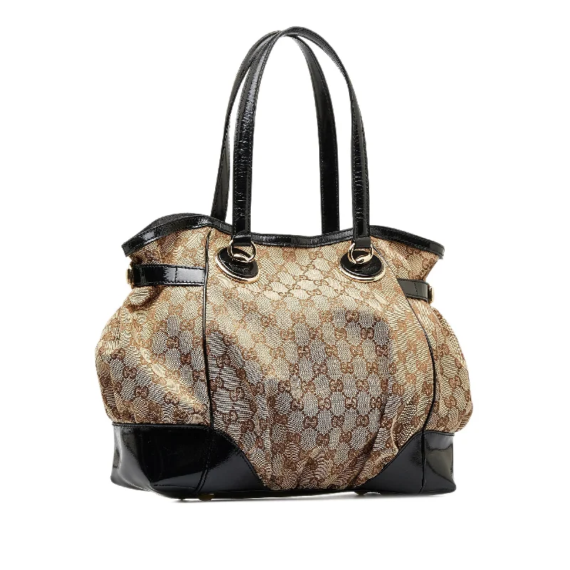 Women Gucci bags with a snap - button closure and a decorative charmGucci GG Canvas Full Moon Tote Bag