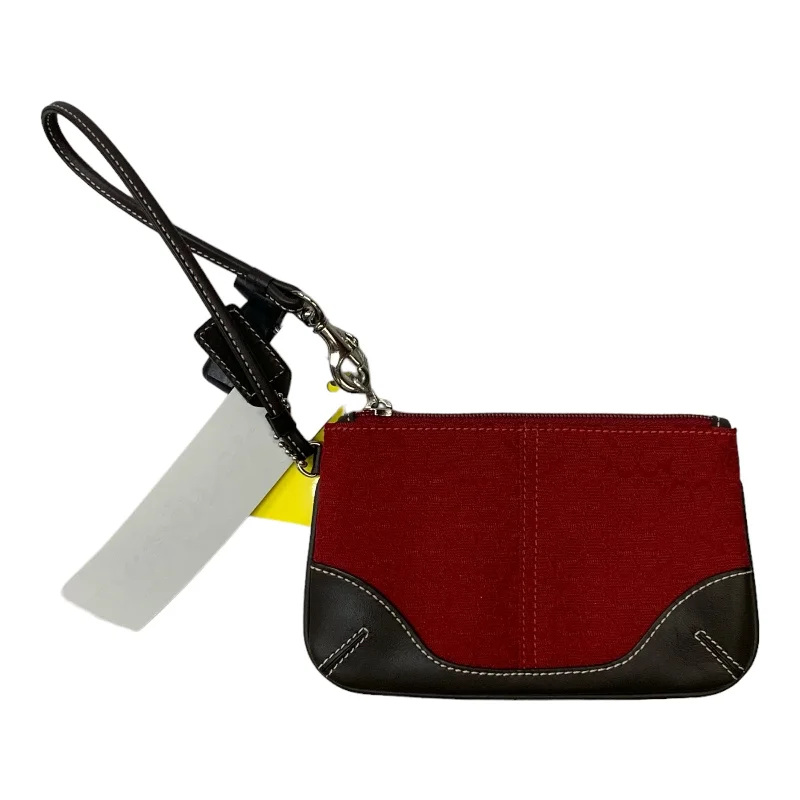 Coach Borough bags with a structured silhouette and a magnetic - snap closureWristlet Designer By Coach, Size: Small