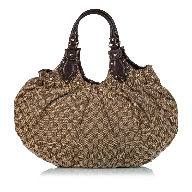 Gucci Marmont bags for women with quilted leather exteriorsGucci GG Canvas Pelham Shoulder Bag