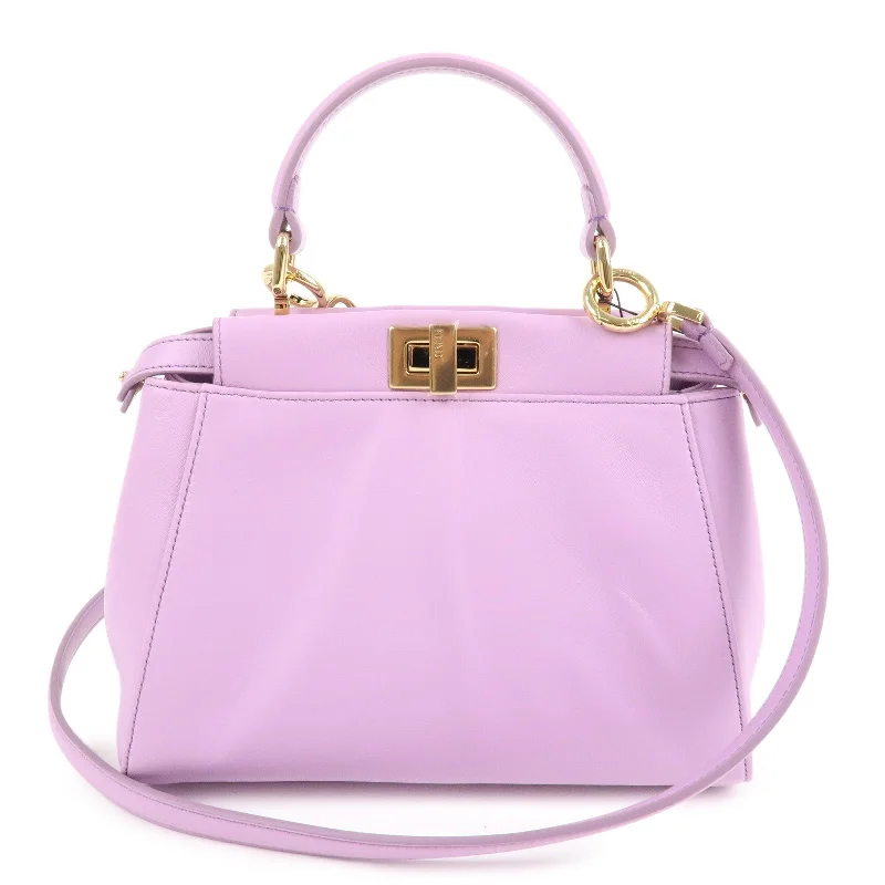 Fendi bags with a leather - bound notebook insert for jotting down notesFENDI Mini Peekaboo Leather 2Way Mini Bag Purple 8BN244