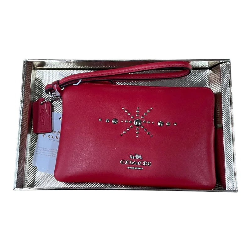 Ladies Coach Tabby bags with a detachable shoulder strapWristlet Designer By Coach, Size: Small