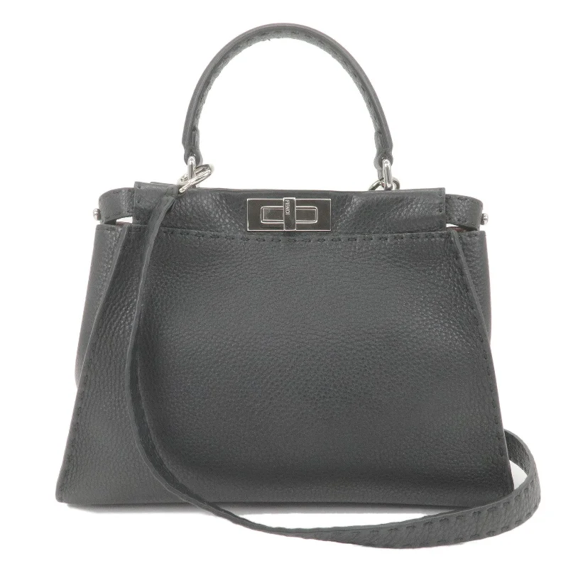 Fendi handbags with a holographic FF logo for a futuristic and trendy lookFENDI Selleria Peekaboo Regular Leather 2WAY Bag Black 8BN290