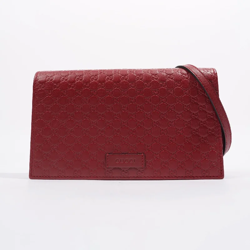 Gucci Marmont bags for women with gold - toned hardwareGucci Womens Micro Guccissima Flap Crossbody Red Leather