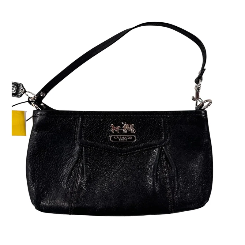 Ladies Coach Tabby bags with a textured leather surface for a more tactile lookWristlet Designer By Coach, Size: Medium