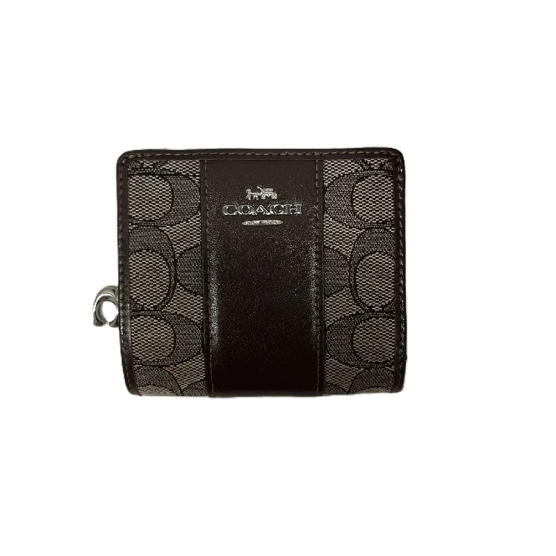 Coach Rogue bags with a detachable shoulder strap for versatile carryingWallet Designer By Coach, Size: Medium