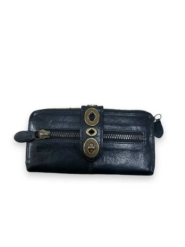 Coach bags with a back - zip pocket for storing valuables securelyWallet Designer By Coach, Size: Medium