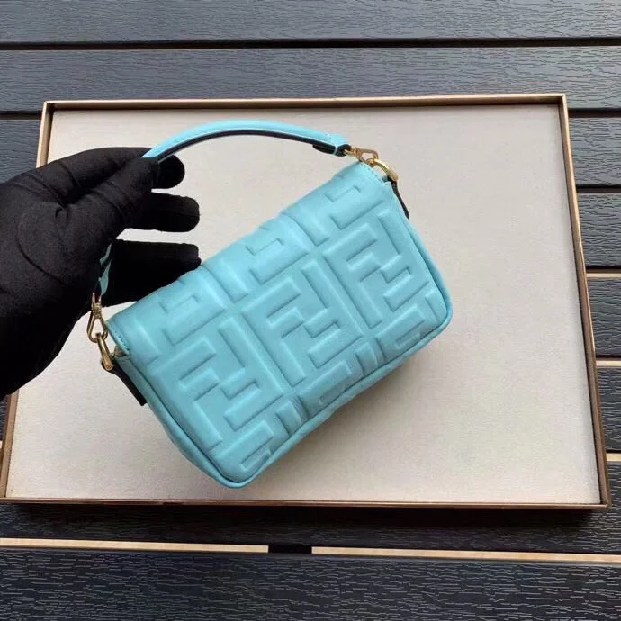 Fendi bags with a touch - screen - friendly pocket for using devices without taking them outFendi Pale Blue FF Motif Mini Baguette Bag