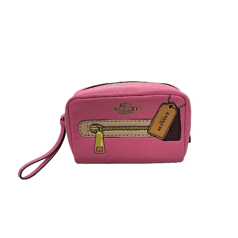 Coach Rogue bags with a monogram - embossed leather surfaceWristlet Designer By Coach, Size: Medium