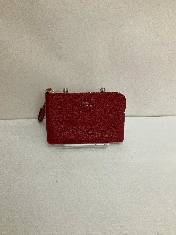 Coach bags with a zip - top closure and a front - pocket for quick accessWristlet Designer By Coach