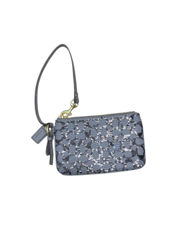 Coach bags with a detachable mobile phone holder for on - the - go useWristlet Designer By Coach, Size: Small