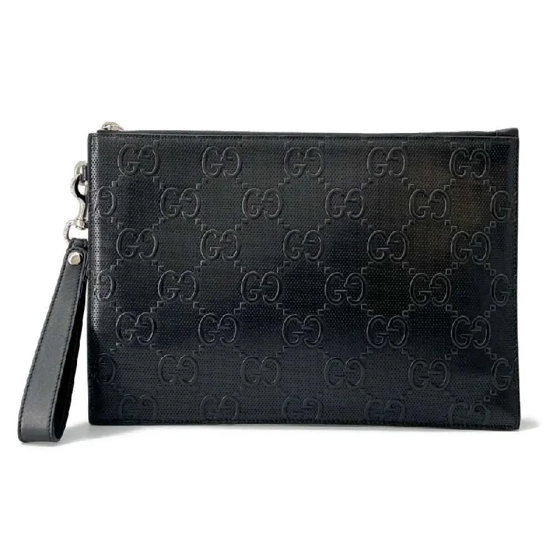 Gucci tote bags for women with a printed Gucci logoGUCCI GG embossed Clutch Bag Black 625569 Leather