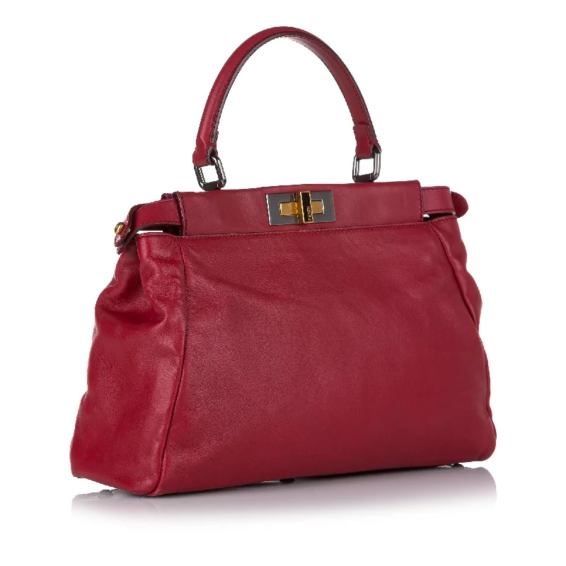 Fendi handbags with a metallic - finish FF logo for a bold and glamorous lookFendi Peekaboo Leather Satchel (SHG-32461)