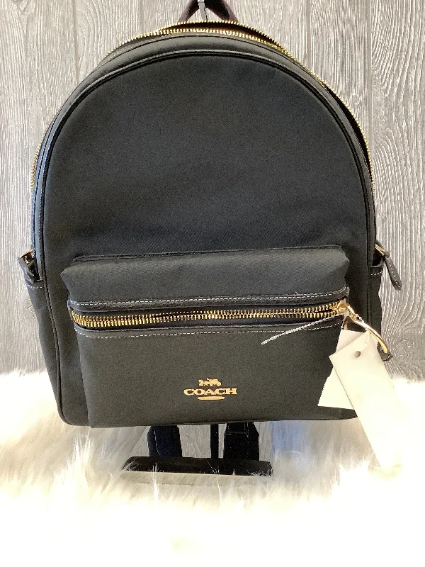 Coach Borough bags with a structured silhouette and a magnetic - snap closureBackpack Designer By Coach, Size: Large